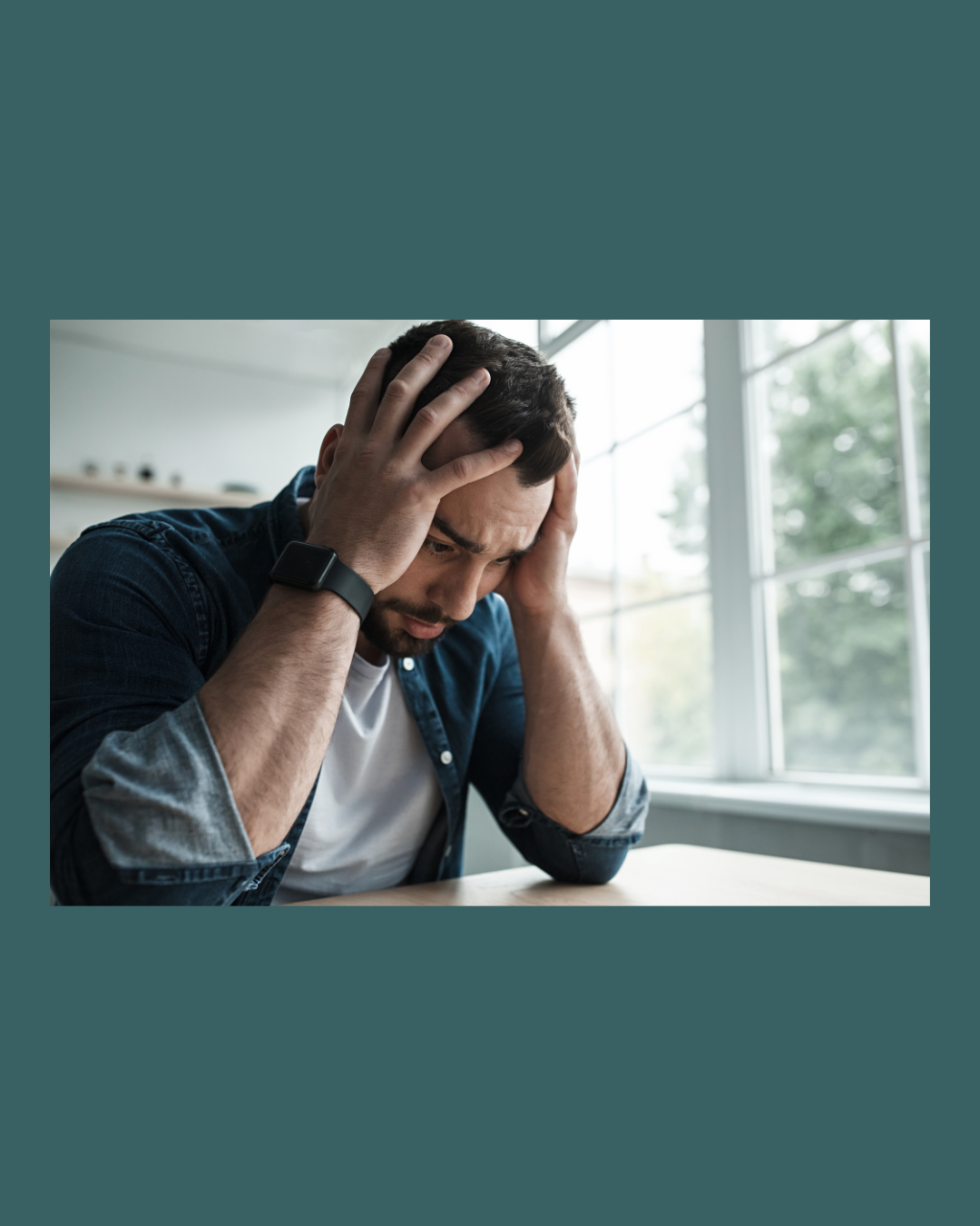 Person hesitating before starting a task at a desk